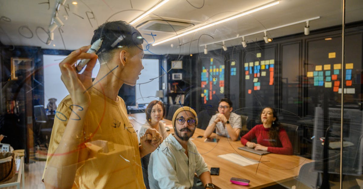 vietnamese team brainstorming marketing in modern office