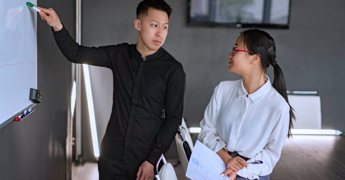 vietnamese team brainstorming marketing in modern office