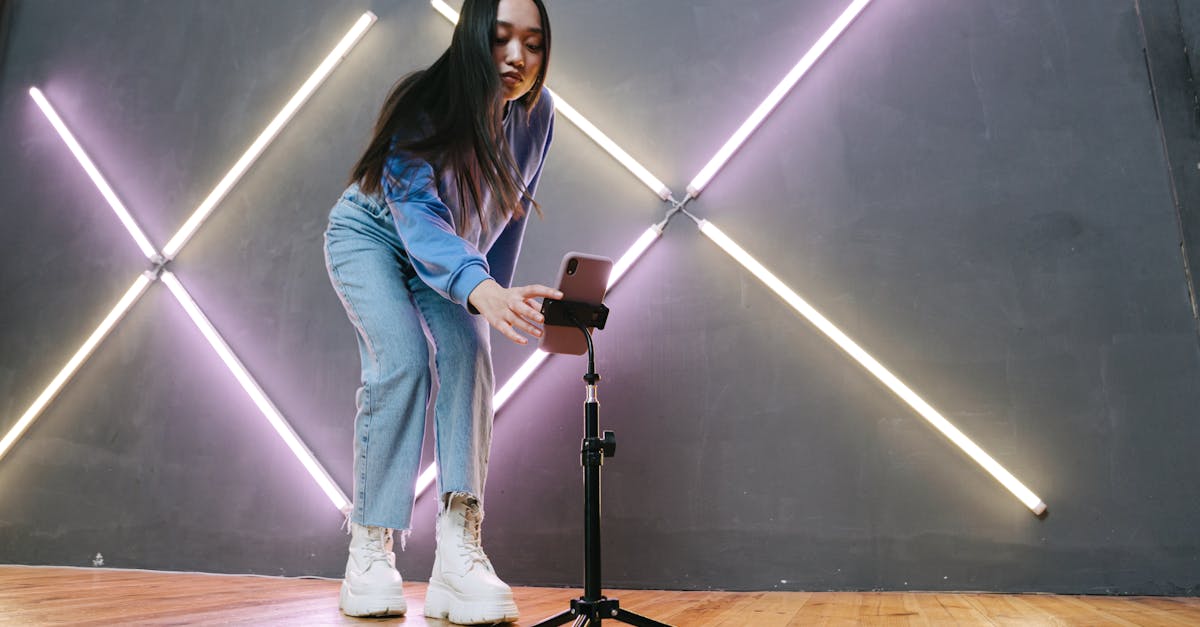 asian content creator filming tiktok video